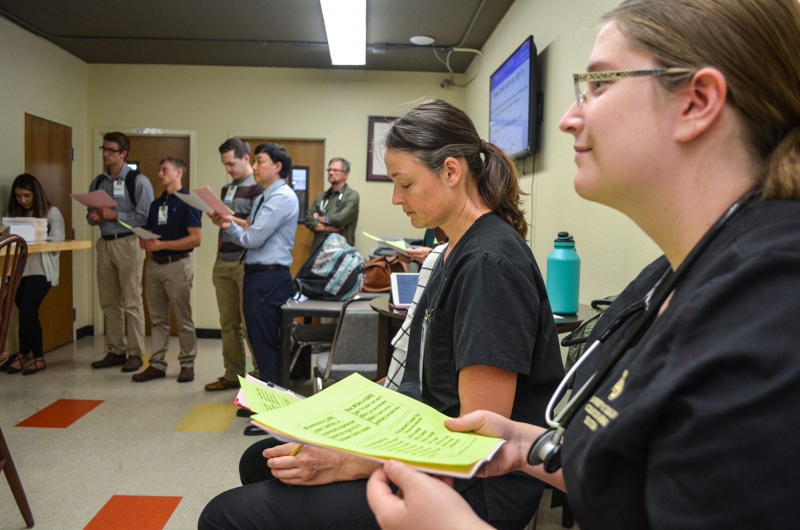 Health professions learners gather in a collaborative learning setting at DAWN.